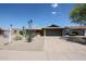 Single-story home boasting desert landscaping, blue sky, and an attached two-car garage at 510 E Fremont Dr, Tempe, AZ 85282