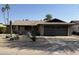 Single-story home featuring desert landscaping, a covered entrance, and a two-car garage at 510 E Fremont Dr, Tempe, AZ 85282