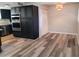 Contemporary kitchen with dark cabinetry, stainless steel appliances, and stylish flooring at 510 E Fremont Dr, Tempe, AZ 85282