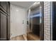 Stainless steel refrigerator next to a pantry door with subway tile backsplash at 510 E Fremont Dr, Tempe, AZ 85282