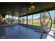 Enclosed patio with tile flooring, ceiling fans and view to backyard at 510 E Fremont Dr, Tempe, AZ 85282