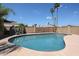 Sparkling pool featuring mature palm trees perfect for relaxing and entertaining at 510 E Fremont Dr, Tempe, AZ 85282