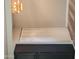 Built-in storage with dark cabinets, white doors and a modern light fixture at 510 E Fremont Dr, Tempe, AZ 85282