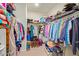 Walk-in closet with rods and shelves for optimal storage at 5218 W Lydia Ln, Laveen, AZ 85339