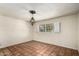 Spacious bedroom features decorative lighting and tile flooring that adds character at 537 N Jay St, Chandler, AZ 85225