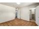 Bedroom featuring tile floors, walk-in closet, and white walls at 537 N Jay St, Chandler, AZ 85225