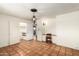 Bright bedroom featuring a closet, and a built-in desk area, all complemented by tile flooring at 537 N Jay St, Chandler, AZ 85225