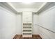Walk-in closet with shelves and hanging racks for organized storage at 537 N Jay St, Chandler, AZ 85225