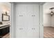 Charming hallway with a built-in closet, connecting to a bathroom and bedroom at 537 N Jay St, Chandler, AZ 85225