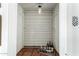 Wine cellar with grid-style shelving, tile flooring, and mood lighting, ready for your collection at 537 N Jay St, Chandler, AZ 85225