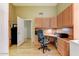 Spacious office features built-in storage, hardwood floors, and great lighting at 5674 W North Ln, Glendale, AZ 85302