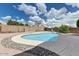 Backyard swimming pool with gravel surround at 5674 W North Ln, Glendale, AZ 85302