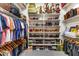 Spacious walk-in closet featuring shoe racks, shelving and clothing racks at 700 N Dobson Rd # 54, Chandler, AZ 85224