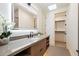 Elegant bathroom with granite countertop, soft lighting, and walk in closet access at 7705 E Doubletree Ranch Rd # 51, Scottsdale, AZ 85258