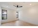 Bright bedroom with hardwood floors, fresh paint, and large windows at 7705 E Doubletree Ranch Rd # 51, Scottsdale, AZ 85258