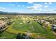 Aerial view of golf course with mature trees, sand traps, and rolling greens in a residential community at 7705 E Doubletree Ranch Rd # 51, Scottsdale, AZ 85258