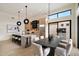 A modern kitchen features an island with seating, stainless steel appliances, and contemporary lighting at 7705 E Doubletree Ranch Rd # 51, Scottsdale, AZ 85258