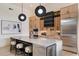 Bright kitchen with a large island, modern appliances, stylish fixtures, and ample cabinet space at 7705 E Doubletree Ranch Rd # 51, Scottsdale, AZ 85258