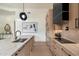 Contemporary kitchen featuring a marble island, modern appliances, and sleek cabinetry with an open layout at 7705 E Doubletree Ranch Rd # 51, Scottsdale, AZ 85258
