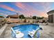 Scenic backyard pool with water features, desert landscaping, and stylish outdoor seating, perfect for relaxation and enjoyment at 7705 E Doubletree Ranch Rd # 51, Scottsdale, AZ 85258