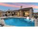 Stunning backyard pool featuring lounge chairs, spa, fire pit, and an expansive patio, perfect for entertaining at 7705 E Doubletree Ranch Rd # 51, Scottsdale, AZ 85258