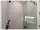 Modern shower with light tile, glass enclosure, and contemporary shower head at 7705 E Doubletree Ranch Rd # 51, Scottsdale, AZ 85258