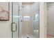 Beautiful tiled shower with glass door and built-in shelving at 7705 E Doubletree Ranch Rd # 51, Scottsdale, AZ 85258