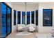 Relaxing bedroom sitting area with floor-to-ceiling windows providing excellent outdoor views at 7705 E Doubletree Ranch Rd # 51, Scottsdale, AZ 85258