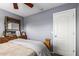 Neutral tone bedroom with a full dresser set and a double bed at 7908 W Rose Garden Ln, Peoria, AZ 85382