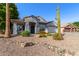 Attractive single-story home with mature landscaping, desert plants and xeriscaping at 7908 W Rose Garden Ln, Peoria, AZ 85382