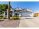 Charming single-story home with low maintenance front yard, desert landscaping and two car garage at 7908 W Rose Garden Ln, Peoria, AZ 85382
