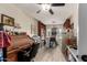 Inviting office space with built-in bookshelves and a classic roll-top desk at 7908 W Rose Garden Ln, Peoria, AZ 85382