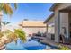 Beautiful blue swimming pool and patio area, designed for relaxation and backyard fun at 7908 W Rose Garden Ln, Peoria, AZ 85382