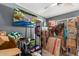 Storage room full of boxes and furniture at 7908 W Rose Garden Ln, Peoria, AZ 85382