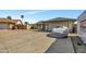 Cozy single-Gathering home featuring xeriscaping, a driveway, and an attached two-car garage at 8137 W Wood Dr, Peoria, AZ 85381