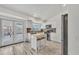Modern kitchen featuring white cabinetry, stainless steel appliances, and stylish flooring at 8137 W Wood Dr, Peoria, AZ 85381