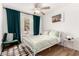 Inviting bedroom featuring a ceiling fan and stylish decor at 8535 W Willow Ave, Peoria, AZ 85381
