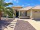 Charming single-Gathering home featuring desert landscaping with a walkway leading to the front door at 8535 W Willow Ave, Peoria, AZ 85381