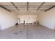 Spacious garage featuring an automatic door and ample room for parking at 8535 W Willow Ave, Peoria, AZ 85381