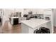 Bright kitchen with stainless steel appliances, breakfast bar and tiled backsplash at 8535 W Willow Ave, Peoria, AZ 85381