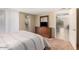 This bedroom features carpet, natural light, and a large bed at 9340 N 92Nd St # 120, Scottsdale, AZ 85258