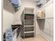 Well-organized closet with shelving and storage options at 9340 N 92Nd St # 120, Scottsdale, AZ 85258