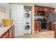 This open-concept kitchen also has a laundry area at 9340 N 92Nd St # 120, Scottsdale, AZ 85258