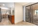 A compact kitchenette provides a practical space with seamless flow to the outside at 9340 N 92Nd St # 120, Scottsdale, AZ 85258