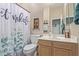 Full bathroom with neutral walls, custom shower curtain, and a sink and vanity at 1085 W Ayrshire Trl, San Tan Valley, AZ 85143