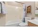 Full bathroom with neutral walls, and a tub and shower combo and a vanity and sink at 1085 W Ayrshire Trl, San Tan Valley, AZ 85143