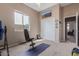 Home gym with carpeted floors, natural lighting, and a closet for storage at 1085 W Ayrshire Trl, San Tan Valley, AZ 85143