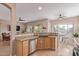 Well-equipped kitchen with modern appliances, ample counter space, and seamless layout at 1085 W Ayrshire Trl, San Tan Valley, AZ 85143