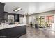 View of kitchen to backyard and stainless steel appliances at 12517 W Santa Fe Ln, El Mirage, AZ 85335