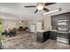 Living space with the kitchen in view at 12517 W Santa Fe Ln, El Mirage, AZ 85335